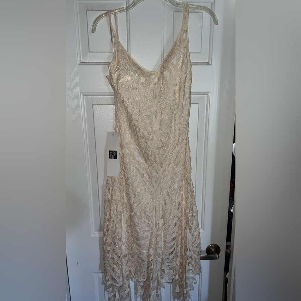 Beautiful lace, spaghetti strap dress.